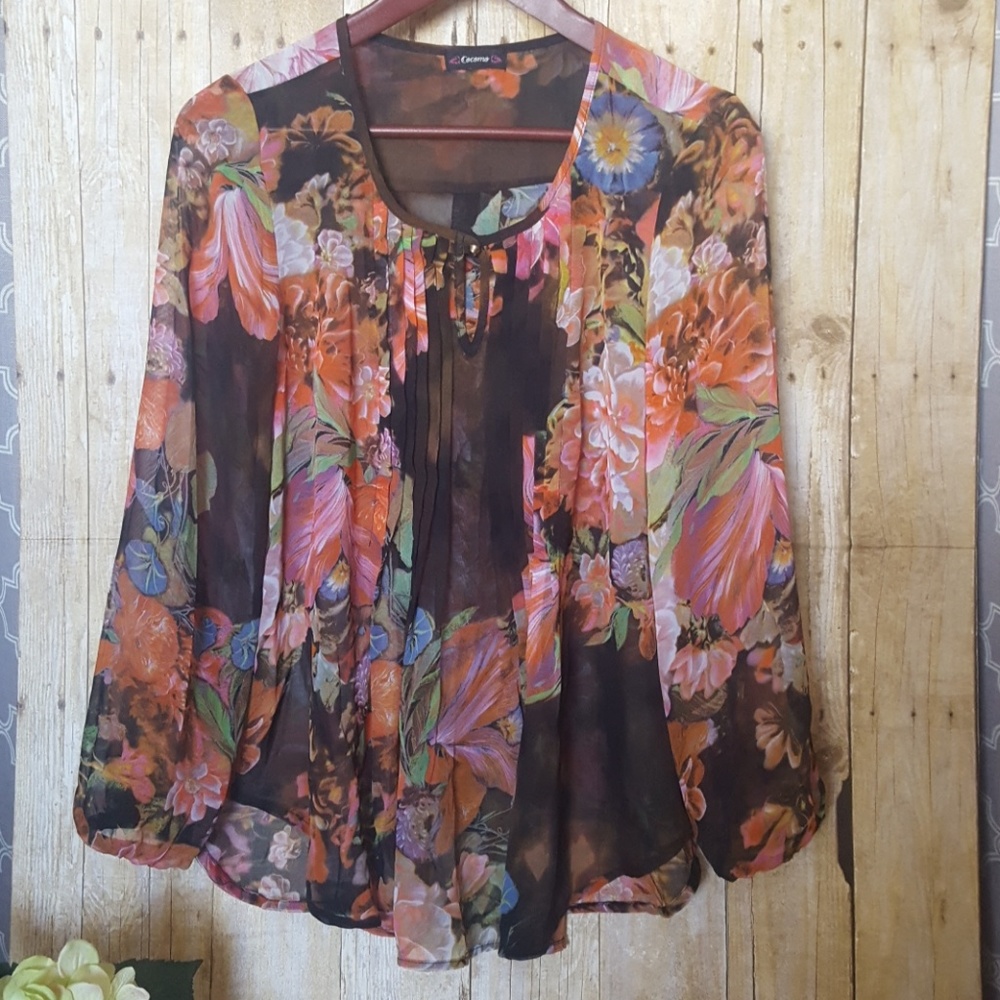 Cocomo sheer top. Size M. Floral print pattern.